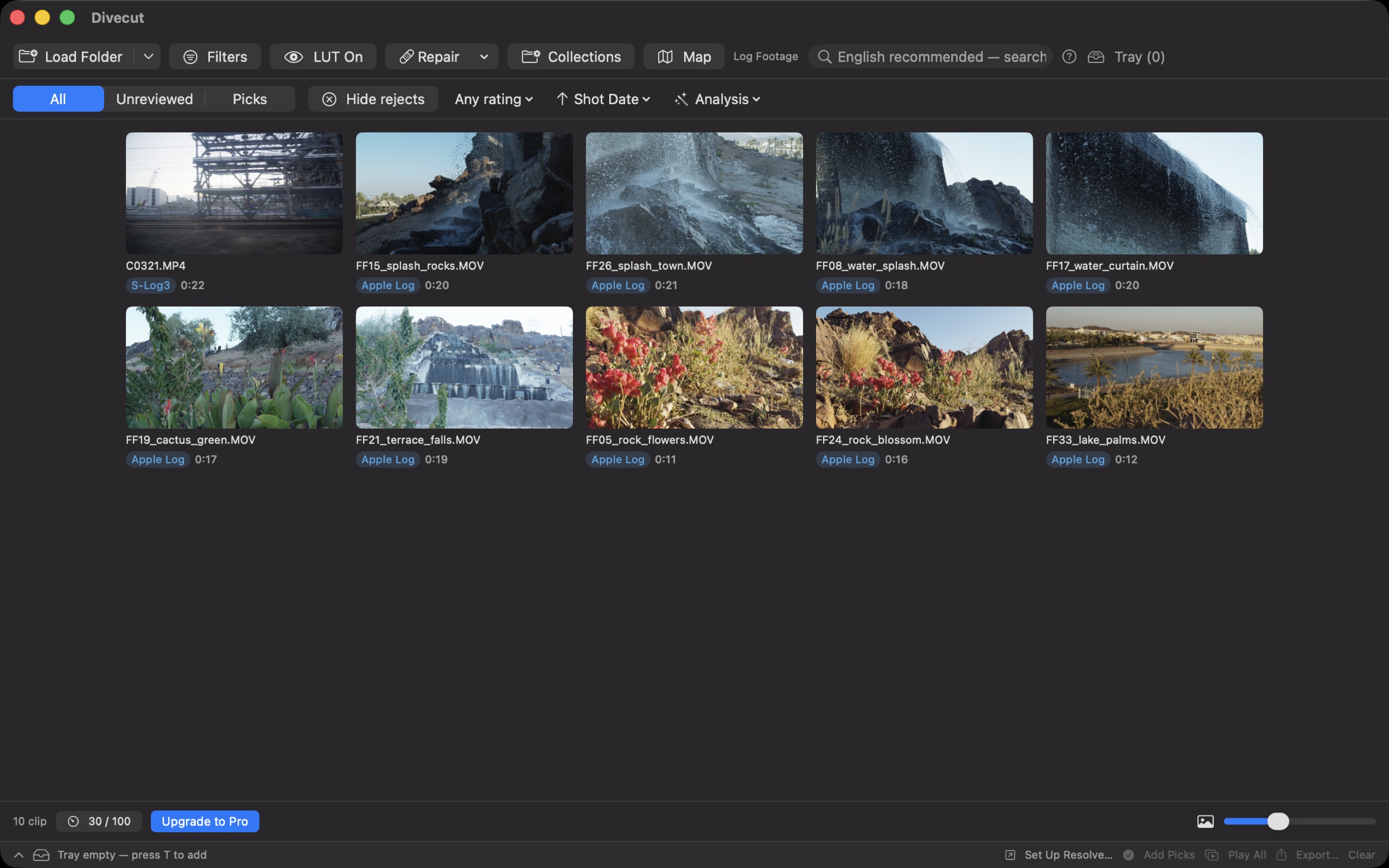 The same folder open in Divecut. Every thumbnail is in normal colour, with a small badge under each name showing the detected Log format.